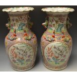 A pair of Chinese Famille Rose ovoid vas