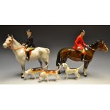 A Beswick huntslady on dappled grey hors