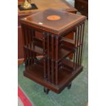 An Edwardian mahogany revolving bookcase