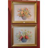 A pair of decorative floral still life o