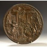 A 19th century bronze plaque, circular,