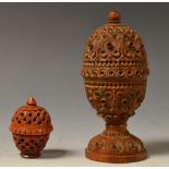 A Coquilla nut spice shaker, intricately