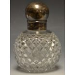 An Edwardian silver topped scent bottle