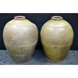 Two Chinese celadon type ovoid wine jars