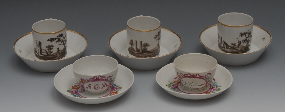 A set of three Paris porcelain coffee ca