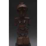 Tribal Art - an African figure, highly s