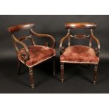 A pair of George IV mahogany elbow chair