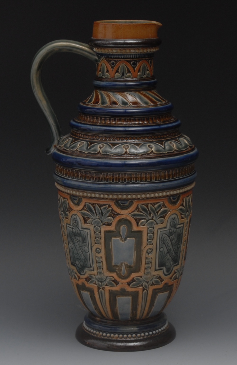 A Doulton Lambeth stoneware ewer, geomet