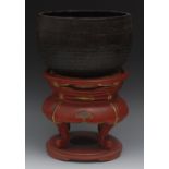 A Tibetan bronze singing bowl, planished