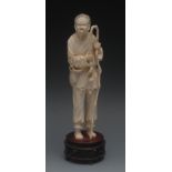 A Chinese ivory figural carving of a wis