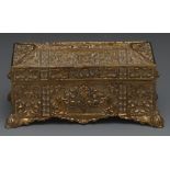 A 19th century gilt brass ink casket, cast overall with flowers and scrolling leaves, enclosing