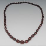 A single strand cherry amber bead neckla