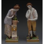 A pair of Sampson Hancock Derby figures,