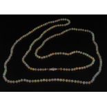 An creamy white opal bead necklace, the
