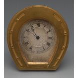 A 19th century gilt brass strut clock, o