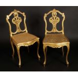 A pair of 19th century giltwood salon ch