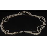 A four strand natural seed pearl necklac