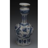 A Dutch Delft panelled bottle vase, long