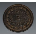 A Chinese bronze circular hand mirror, c