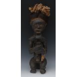 Tribal Art - an African carved wooden fi