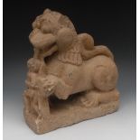 Antiquities - a sandstone stylised lion and goddess, possibly Durga, 46cm high