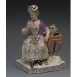 A Vienna figure, of a lady, seated by a