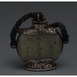 A Tibetan silver coloured metal mounted