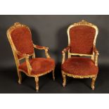 A pair of Louis XV style giltwood elbow