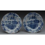 A pair of English Delft plates, boldly d