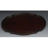 A Chippendale design mahogany shaped oval waiter, moulded piecrust border, 39cm wide, 19th century