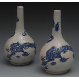 A pair of Chinese bottle vases, printed