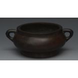 A Chinese bronze censer, lug handles, 17