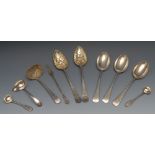 A pair of George III silver serving spoons, the bowls later embossed with with pineapples and