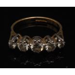 A diamond set five stone ring, central r