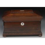 A 19th century rosewood sarcophagus work box, the cover with egg-and-dart tablet, centred with