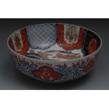 A Japanese Imari bowl, decorated with hu