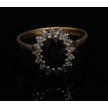 A cubic zirconia cluster ring, central d