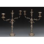 A pair of Victorian E.P.N.S three-light two-branch table candelabra, pine cone snuffer finials,