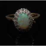 An opal and diamond cluster ring, centra