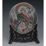 A Chinese Famille Verte roundel, enamell