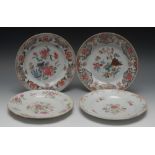 An 18th century Chinese Famille Rose circular plate, decorated with bird and peonies, 23cm diam,