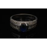 A contemporary sapphire and diamond ring