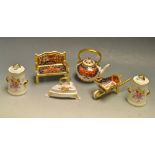 A Royal Crown Derby miniature park bench