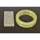 A Chinese pale apple green jade bangle,