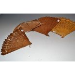 A Chinese-type hardwood fan, the folds a