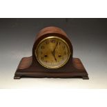 A 1920's mahogany veneered mantel clock,