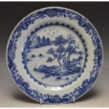 A Chinese circular plate, painted in und