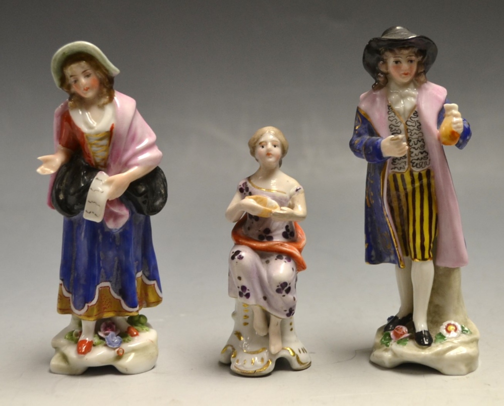 A pair of Continental miniature figures,