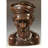 A carved bust, man with a turban