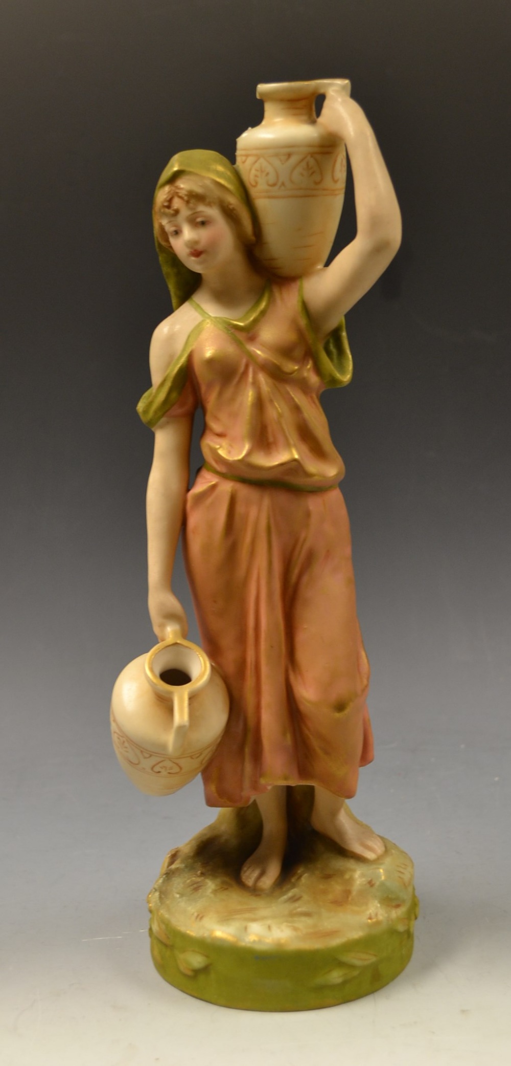 A Royal Dux figure female water carrier,